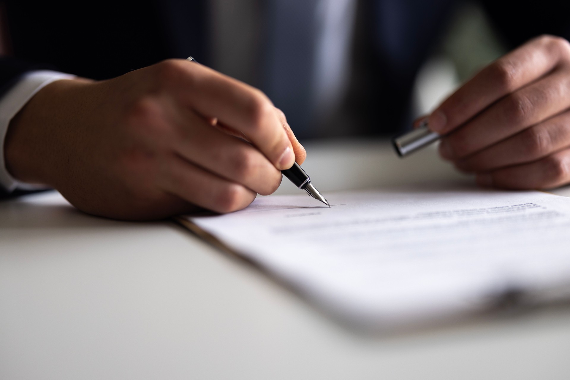 Businessman Signing Contract In The Office